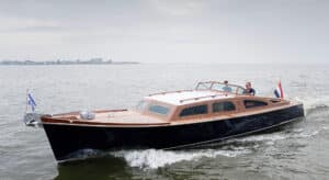 Classic Feadship yacht Mira cruising silently with a 60 kW electric propulsion system by STOK Electric.